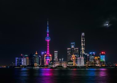 shanghai skyline at night with moon
