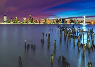 cityscape at dusk with wooden pilings