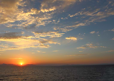 Ocean Sunset with Cloudy Sky