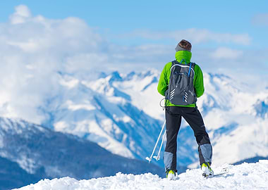 Skier on Mountain Peak