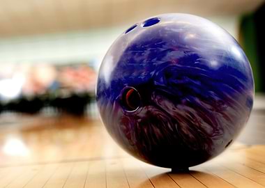 Bowling ball on wooden lane