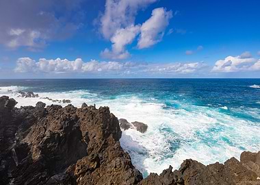 Ocean waves crashing on rocky shore, Madeira