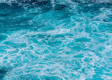 Turquoise Ocean Water with White Foam