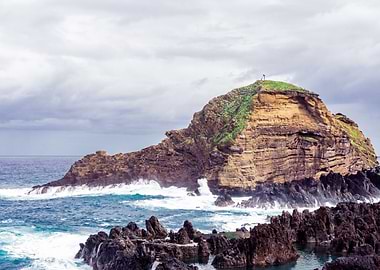 Island Rock Formation with Ocean Waves