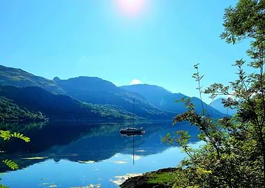 Sailboat on a serene lake landscape, Scotland