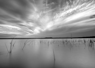 Monochrome Lake Landscape with Dramatic Sky