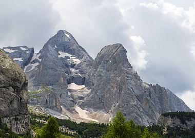 Majestic Marmolada Mountain Peaks Under Cloudy Sky - ITaly