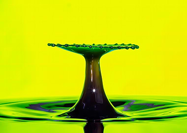 Water Drop Collision with Yellow Background