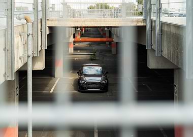 Black Audi RS3 in Parking Garage