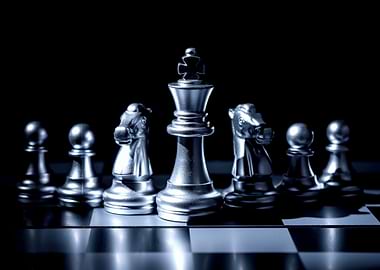 Silver Chess Pieces on Chessboard