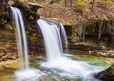 Cascading Waterfall of the Mèbre River in Lush Forest Setting