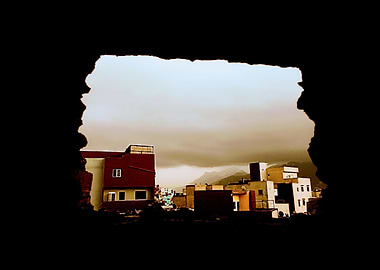 Cityscape through a dark frame