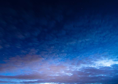 Night Sky with Clouds and Stars