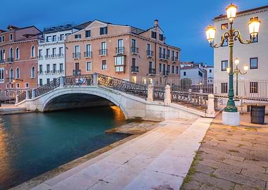 Venice canal bridge at dusk