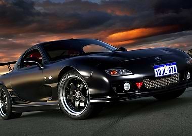 Sleek Black Mazda RX-7 at Sunset