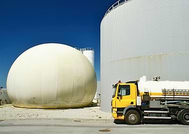 Industrial Tanks and Yellow Truck