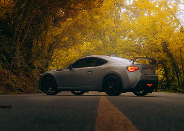 Silver Subaru BRZ on Autumn Road
