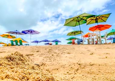 Beach with colorful umbrellas in Maceio