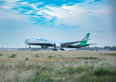 BOEING 777 EVA Air plane landing on runway