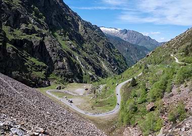 Mountain Pass Road with Cyclist Race