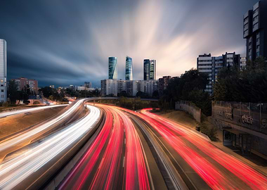 Cityscape with Light Trails and Skyscrapers