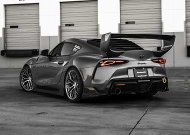 Gray Toyota Supra with Custom Wing