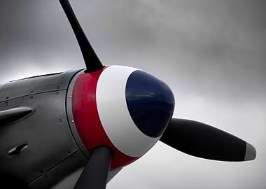 Close-up of Airplane nose cone and Propeller with Tricolor Design