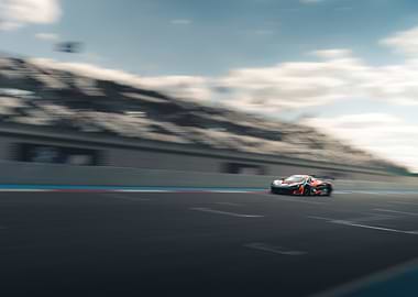 Racing car speeding on a track
