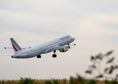 Airbus A321 sunset takeoff