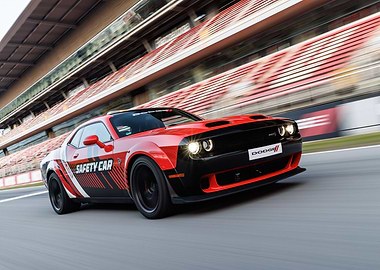 Red Dodge Challenger Safety Car on Track