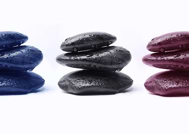 Rock Balancing in Blue, Black, and Red Colours