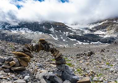 Rock Balancing Archway in Mountainous Landscape