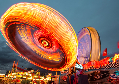 spinning carnival ride at night