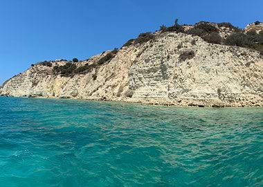 Coastal Cliff and Turquoise Water