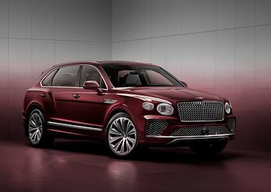 maroon bentley bentayga SUV studio shot