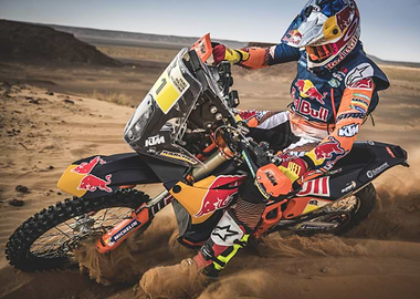Motocross Rider in Desert Landscape