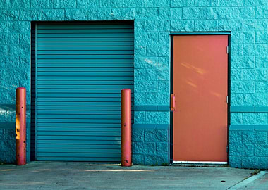 Blue Brick Building with Orange Door