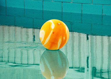 Orange and White Ball in Water