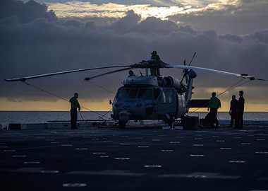 Naval Helicopter Against Golden Horizon
