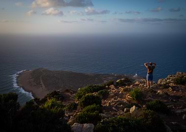 Coastal View with Person and Lighthouse