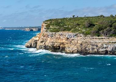 Rocky East Coast of Mallorca at Cala Romantica with Blue Mediterranean Sea