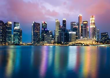singapore skyline at night with water reflection