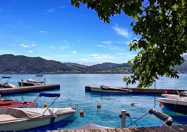 Boats on a Lake with Mountains