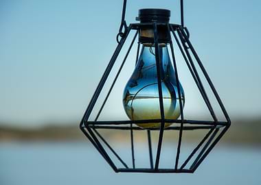 Reflections at Dusk: Lantern Over Water