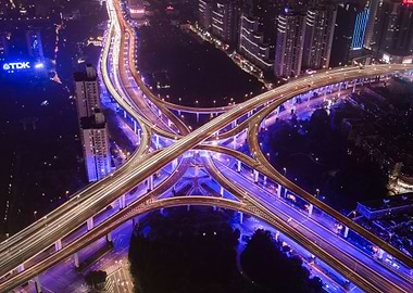 night cityscape with highway interchange