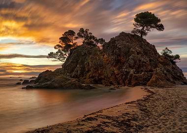 Rocky Island at Sunset Costa Brava Beach Landscape