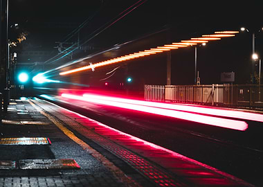 Night Train Speeding Through Station