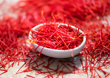 Saffron threads in a white bowl