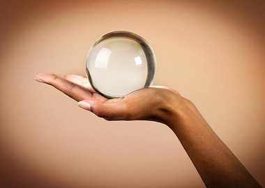 Crystal ball on hand