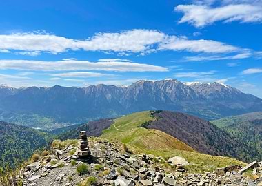 Mountain Vista with Stone Cairn